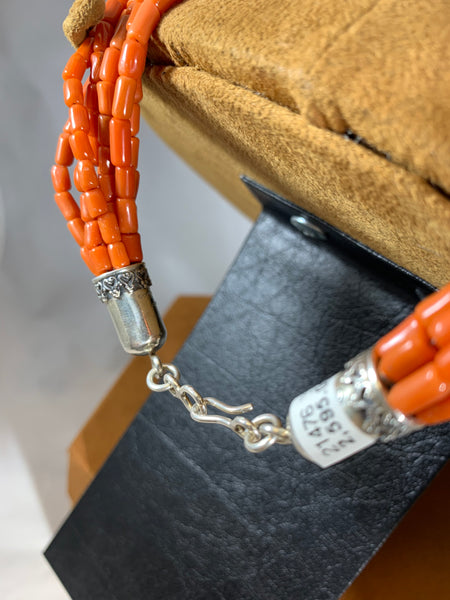 Seven Strand Coral Cross Necklace by Don Lucas