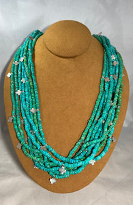 Eight Strand Arizona Turquoise Cross Necklace by Dennis Hogan