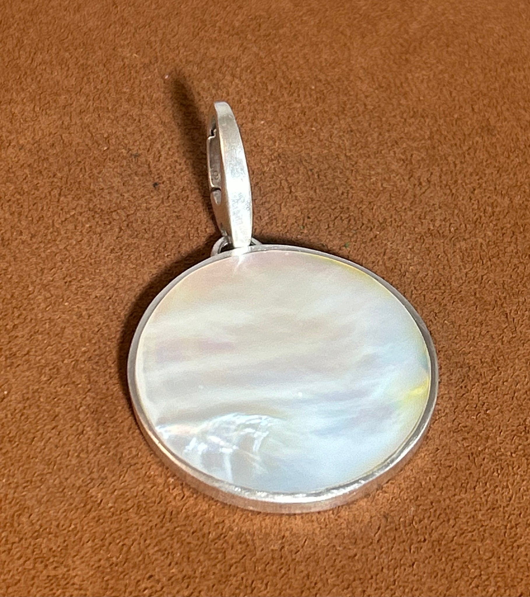 Mother of Pearl Circle Pendant by Gloria Sawin and John Hull