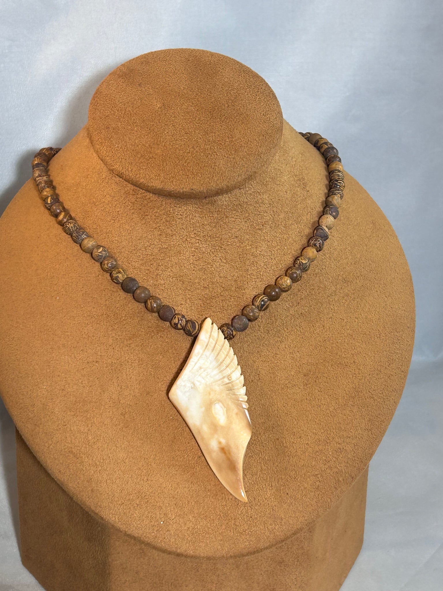 Fossilized Walrus Ivory on Pipestone Beads by Gloria Sawin and John Hull