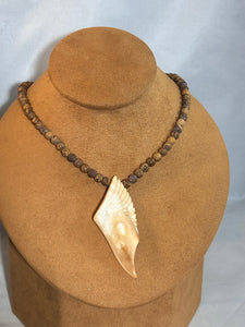 Fossilized Walrus Ivory on Pipestone Beads by Gloria Sawin and John Hull