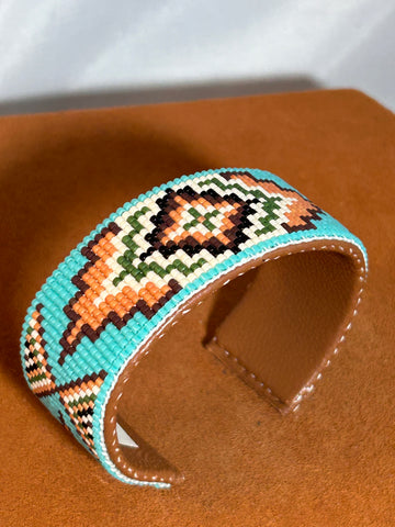 Classic Rug Design in Blue with Beaded Cuff by Pamela Chappell