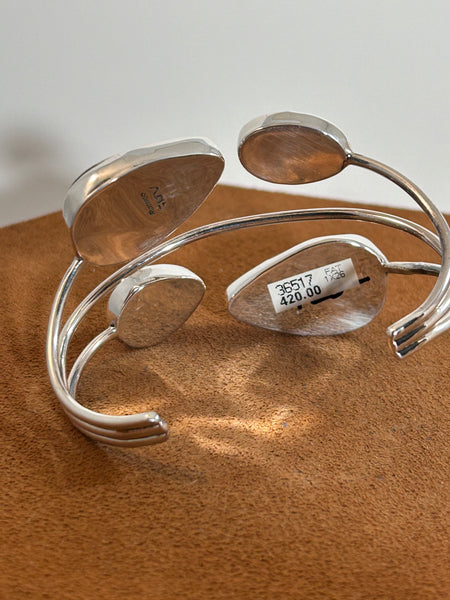 Contemporary Four Stone White Buffalo Cuff by First American Traders.