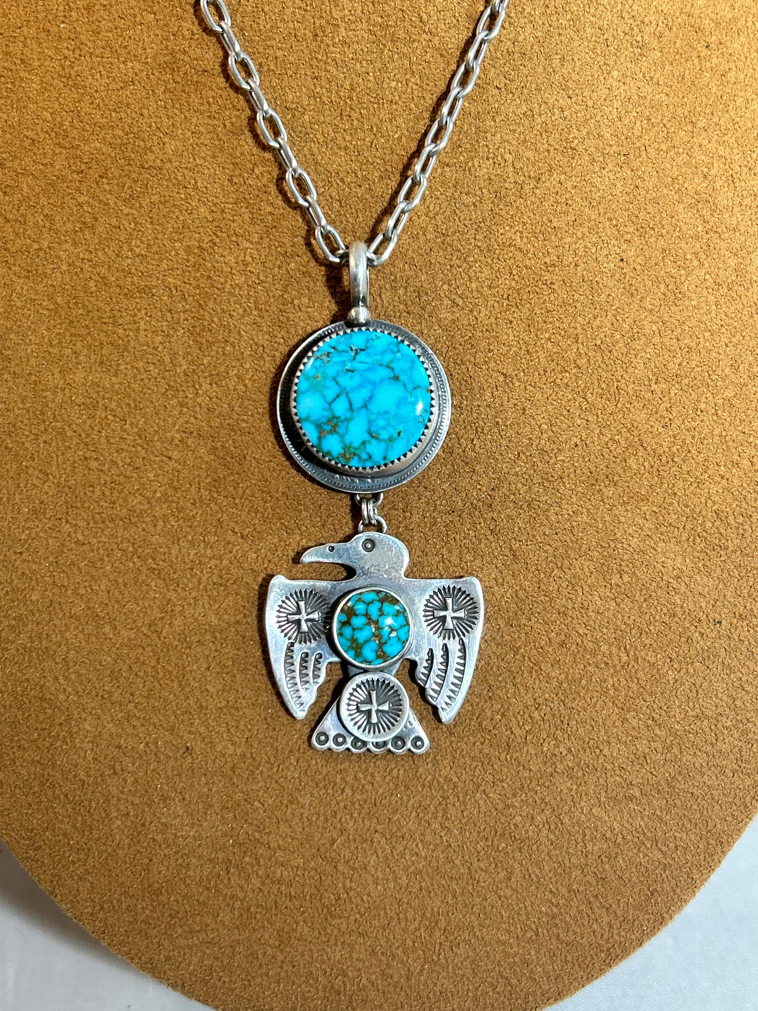 Thunderbird and Turquoise on Swiss Coin Necklace by Dennis Hogan