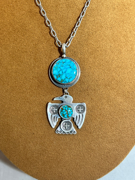 Thunderbird and Turquoise on Swiss Coin Necklace by Dennis Hogan