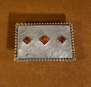 Amber and Silver Buckle by Clif Doran