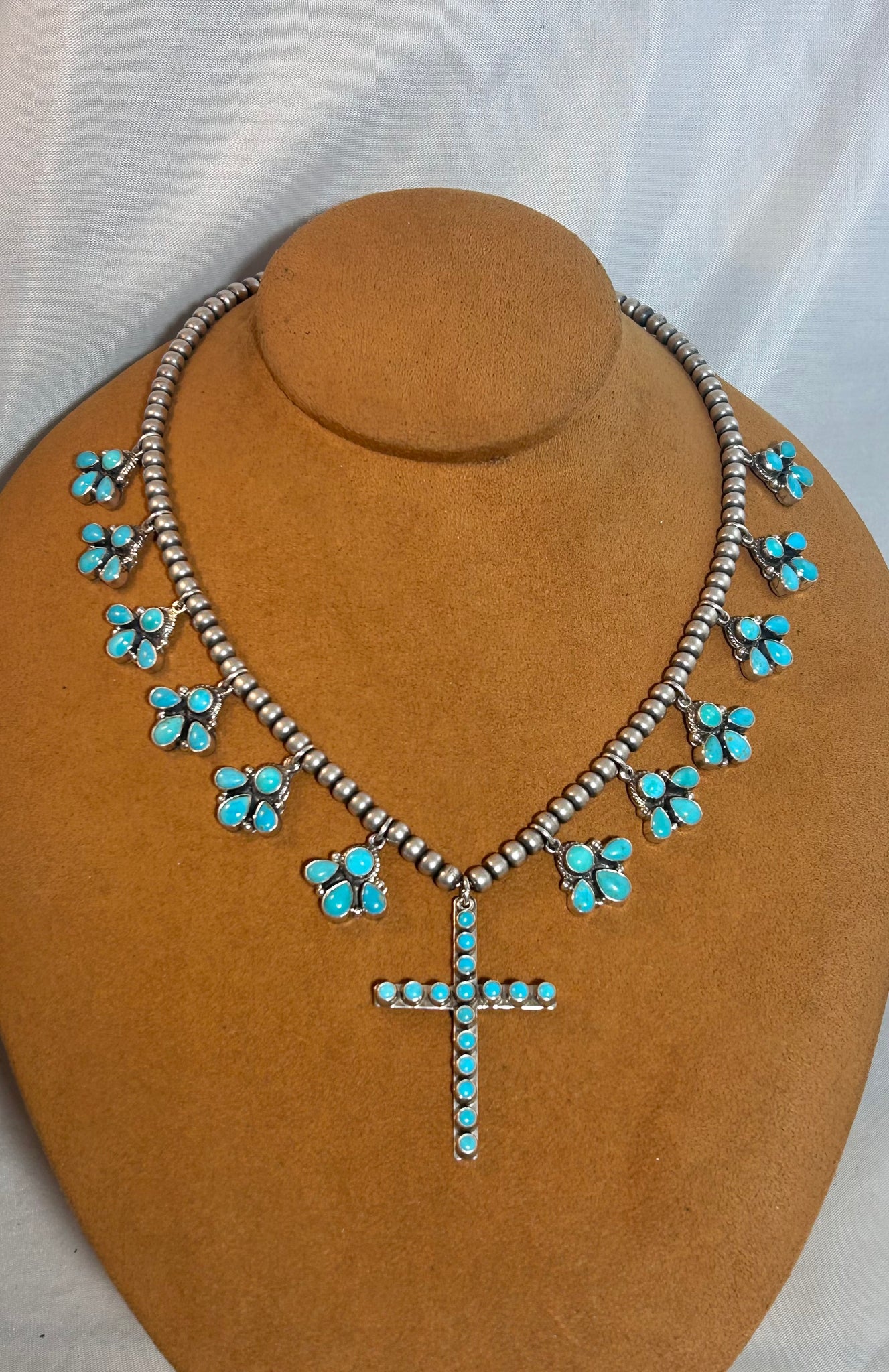 Turquoise Squash Blossom with Cross by Don Lucas