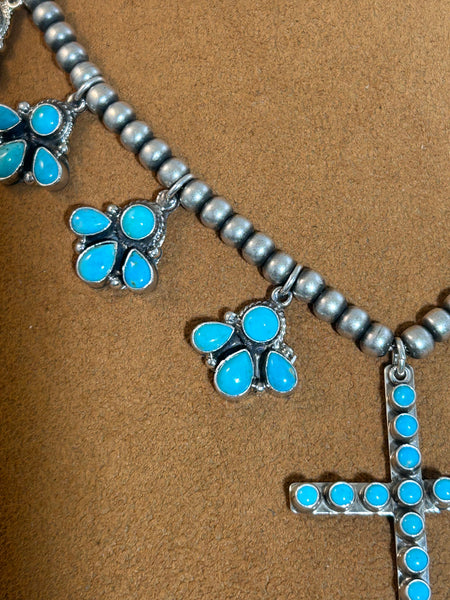 Turquoise Squash Blossom with Cross by Don Lucas