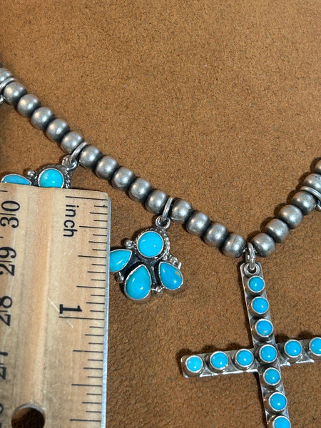 Turquoise Squash Blossom with Cross by Don Lucas