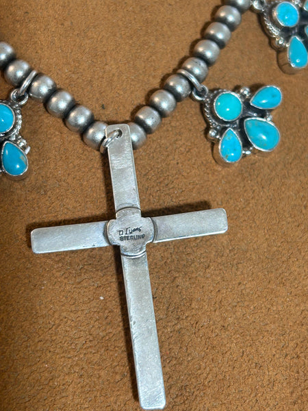 Turquoise Squash Blossom with Cross by Don Lucas