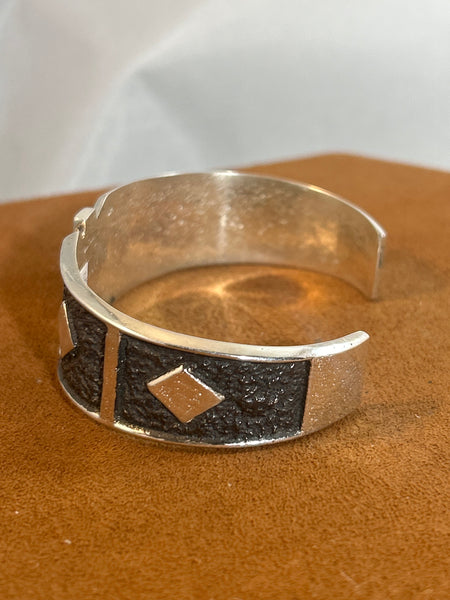 Cross Cuff by Earl Plummer