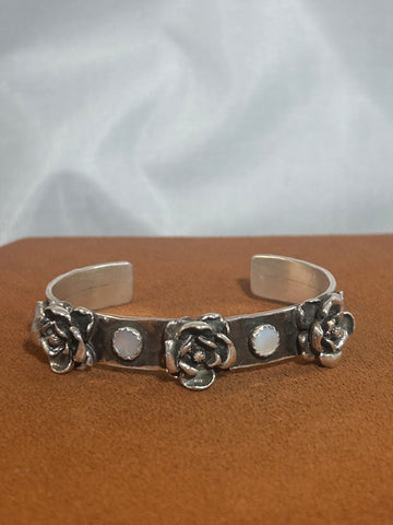 Triple Rose Cuff by Richard Schmidt