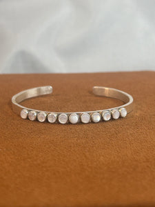 Slender 11 Stone Mother of Pearl Cuff by Richard Schmidt